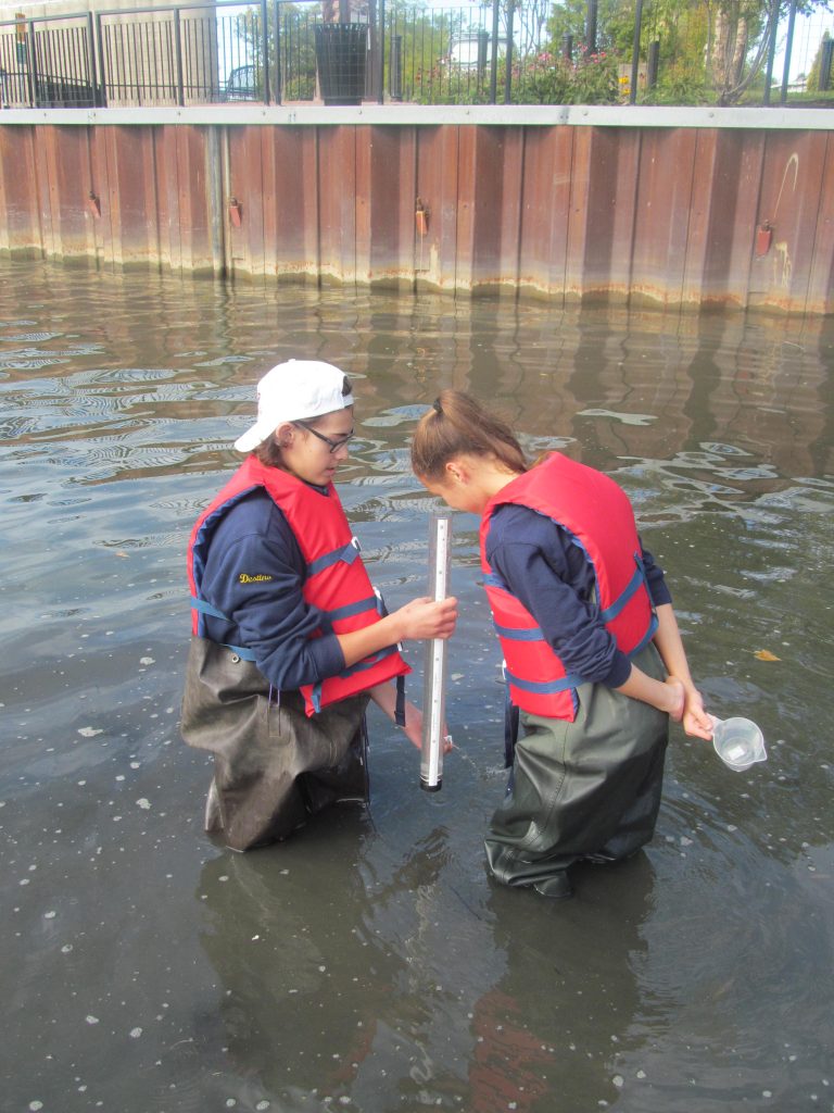 2 students testing water