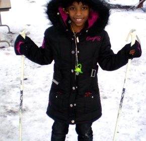 child in snowshoes